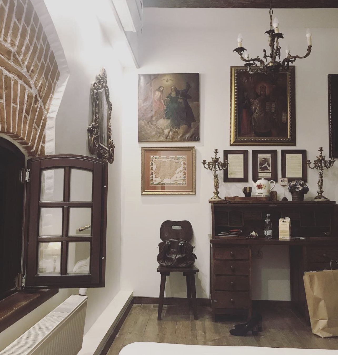 A castle room at night with ancient images on the walls